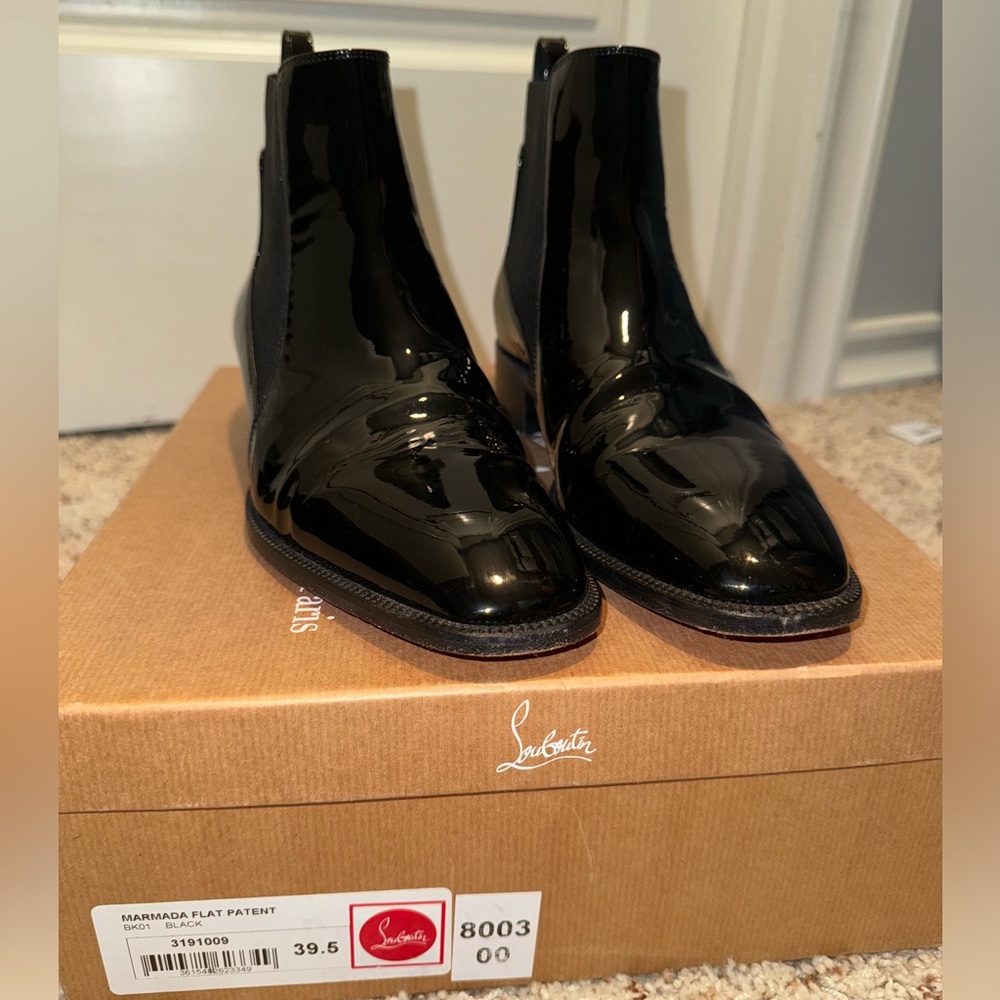 Patent leather Louboutin boots